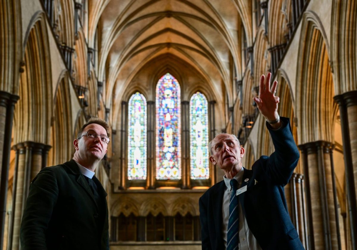 Canon treasurer being shown around Salisbury Cathedral.