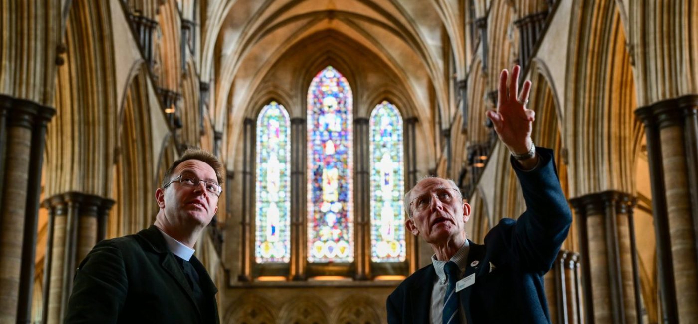 Canon treasurer being shown around Salisbury Cathedral.