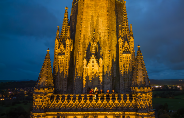 The Cathedral tower balcony after dark with a group of visitors