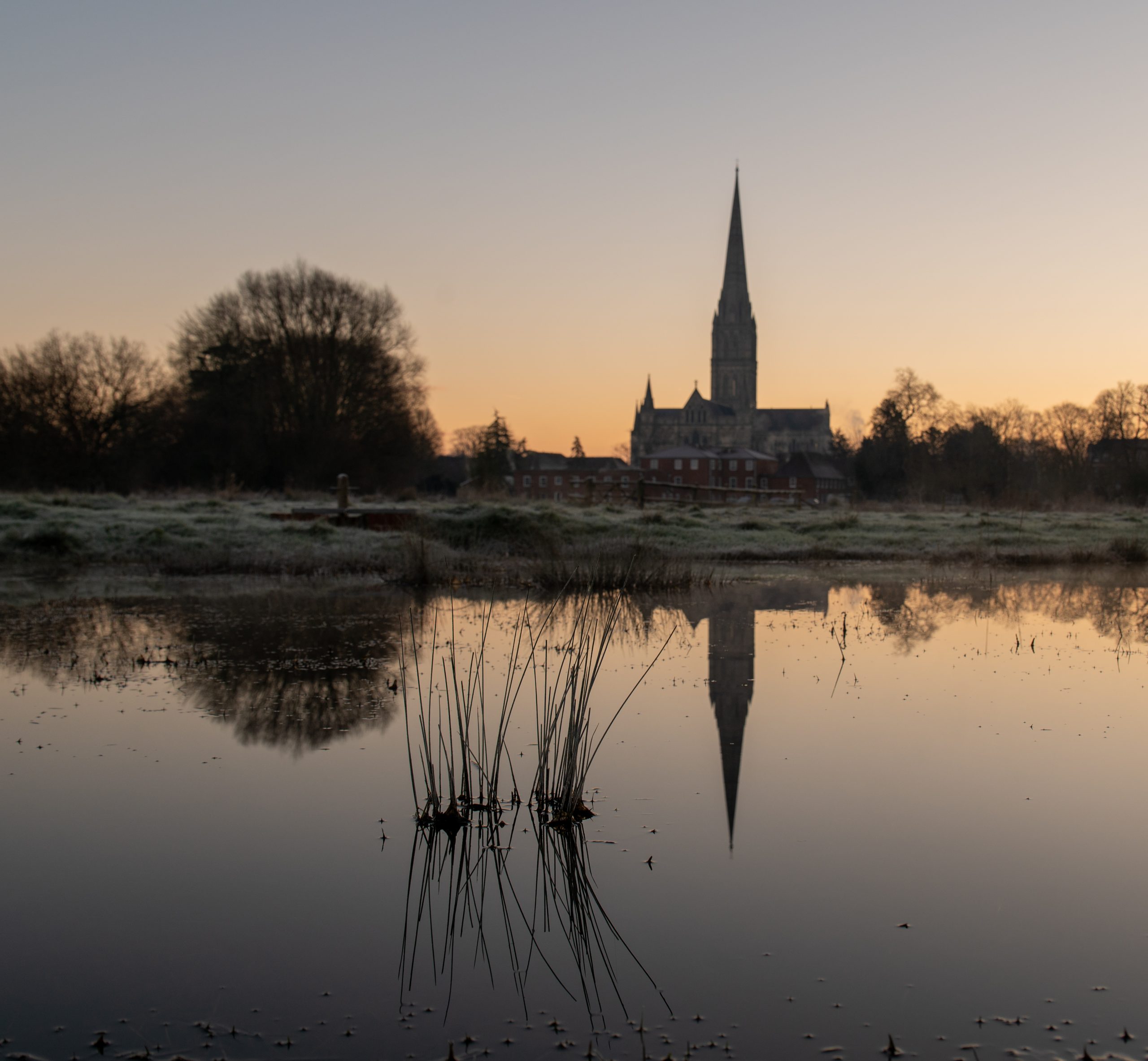 Cathedral silhouette reflected in the river
