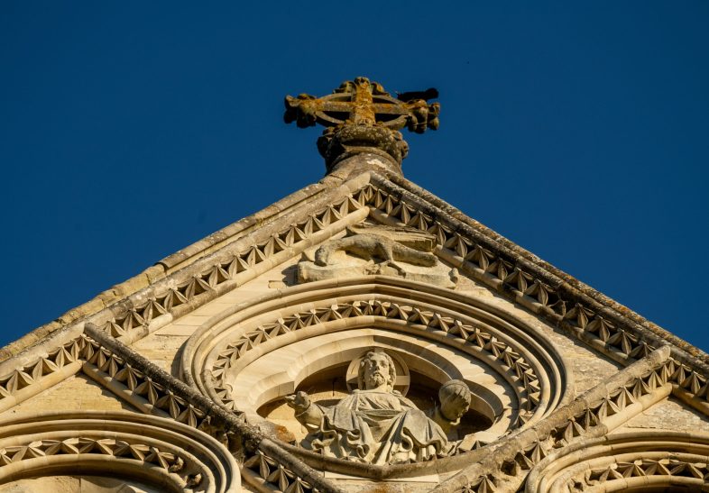 Photo showing details of the veyr top of the West Front of the Cathedral, with Christ in Majesty.